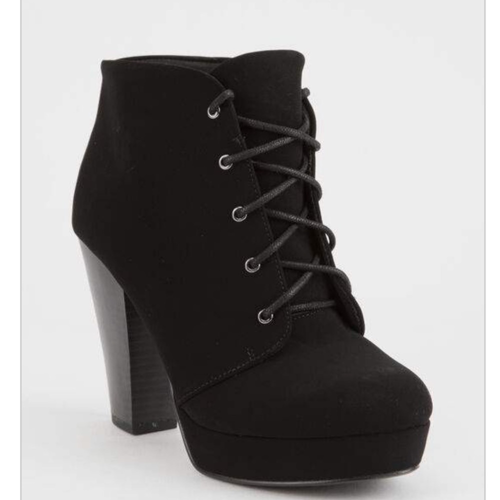 Lace up heeled boots